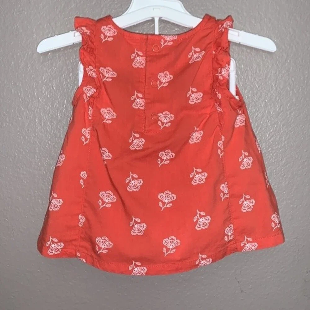 Carter's 12 month baby girl set of top and shorts.